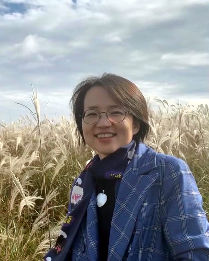 Portrait of Joohee Seo among silver grass